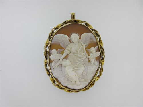 Lot 22 - A large shell cameo brooch / pendant after Raphael, depicting the allegorical figure of Poetry