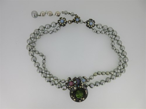 Lot 105 - Miriam Haskell - A mid 20th century faux pearl necklace with feature floral clusters