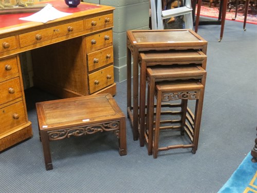 Lot 336 - A 20th century nest of Chinese hardwood tables...
