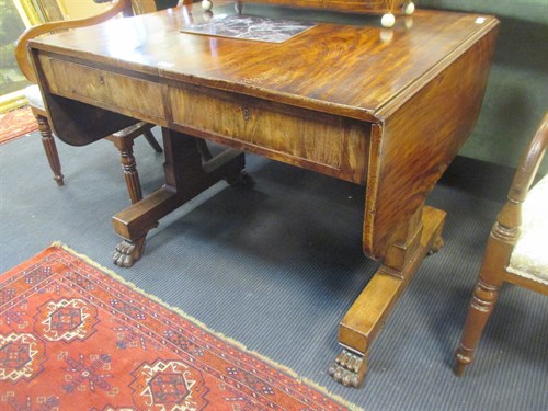 Lot 380 - A 19th century sofa table, the frieze fitted...