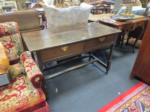 Lot 357 - A George III oak two-door side table, on...