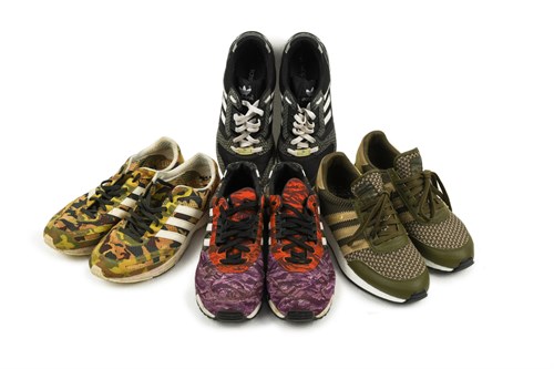 Lot 43 - Adidas, a pair of Black Scale ZX7000 trainers