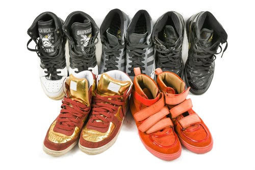 Lot 53 - Vivienne Westwood, a pair of red suede hi-top trainers, 2012
