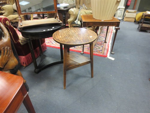 Lot 398 - An oak two tier cricket table