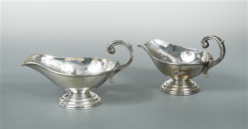 Lot 534 - A pair of continental metalwares sauce boats