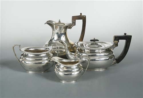 Lot 666 - A George V silver four piece silver tea and coffee set