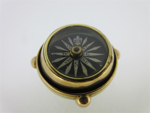 Lot 40 - A gimbal compass pendant