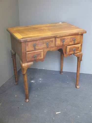 Lot 424 - An 18th century walnut lowboy 71 x 73 x 47cm