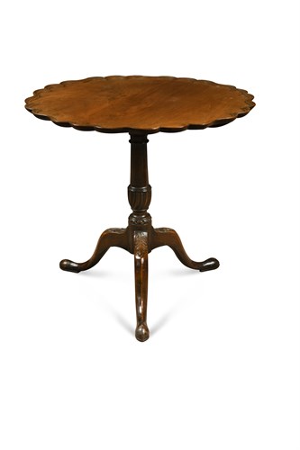 Lot 481 - A George III mahogany tripod table