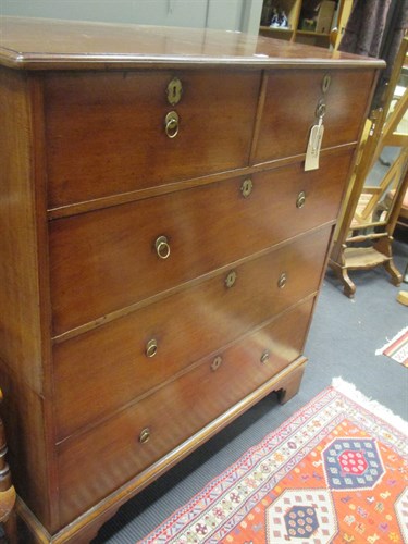 Lot 600 - A George III red walnut chest of drawers -...