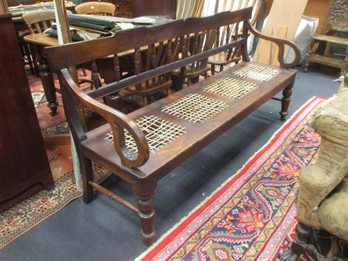 Lot 456 - A 19th century African stinkwood bench 185cm wide