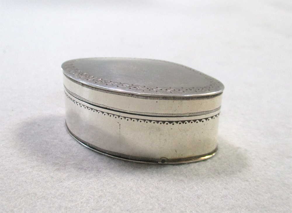 Lot 334 - A George III silver nutmeg grater