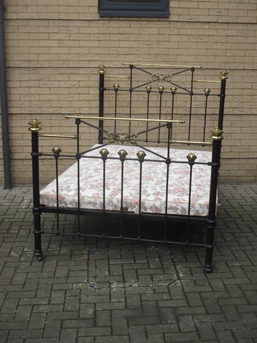 Lot 557 - A 19th century brass and iron bedstead