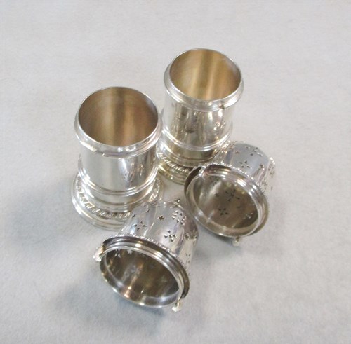 Lot 646 - A pair of Edward VII silver pepper casters
