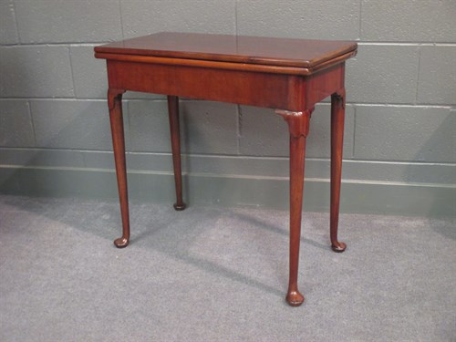 Lot 610 - A late 18th century mahogany card table, the...