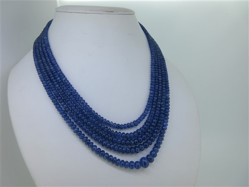 Lot 290 - A five row sapphire bead necklace with gold and diamond clasp