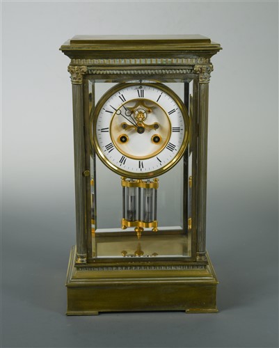 Lot 386 - A French four glass mantel clock