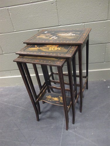 Lot 532 - A nest of Edwardian black lacquer occasional...