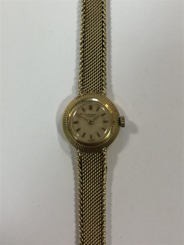 Lot 470 - IWC - A lady's 18ct gold wristwatch with later bracelet