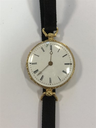 Lot 453 - Unsigned - A lady's key wind wristwatch with enamel reverse