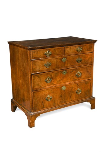 Lot 440 - An 18th century walnut chest