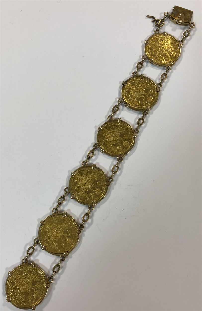 Lot 356 - A bracelet set with six Austrian one ducat gold coins