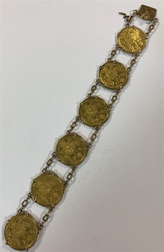 Lot 356 - A bracelet set with six Austrian one ducat gold coins
