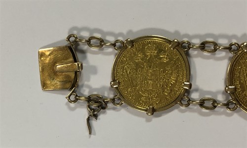 Lot 356 - A bracelet set with six Austrian one ducat gold coins
