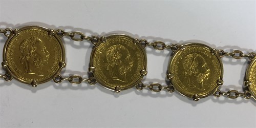 Lot 356 - A bracelet set with six Austrian one ducat gold coins