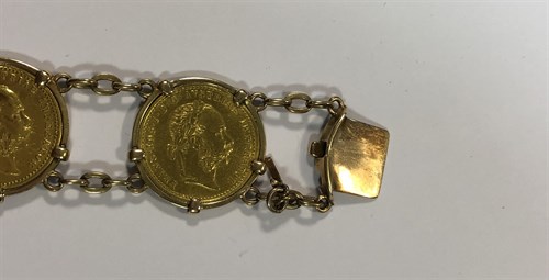 Lot 356 - A bracelet set with six Austrian one ducat gold coins