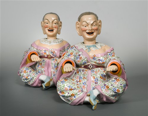 Lot 19 - A pair of 19th century German porcelain nodding head pagoda figures