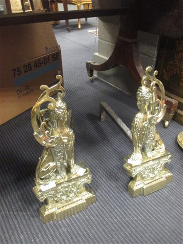 Lot 374 - A pair of brass andirons