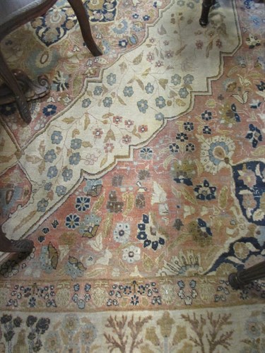 Lot 685 - A Tabriz carpet, decorated with animals to a...