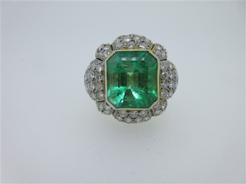 Lot 312 - An impressive emerald and diamond dress ring