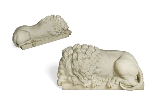 Lot 337 - A pair of white marble composition Canova Lion figures