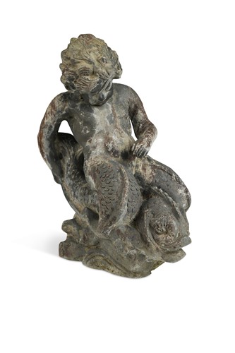 Lot 338 - An 18th century lead figure of a cherub riding a Dolphin