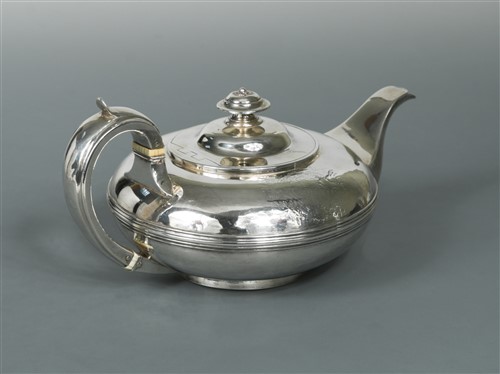 Lot 594 - A George IV silver teapot