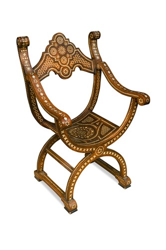 Lot 563 - A late 19th century Syrian X framed armchair