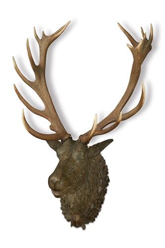 Lot 300 - A 19th century Black Forest carved wood stag's head