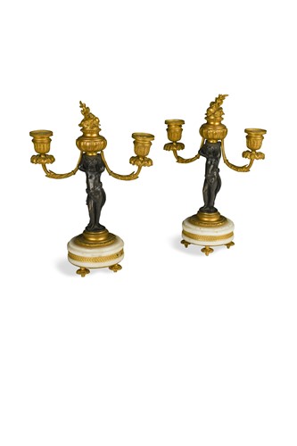 Lot 304 - A pair of 19th century bronze and ormolu twin branch candlesticks