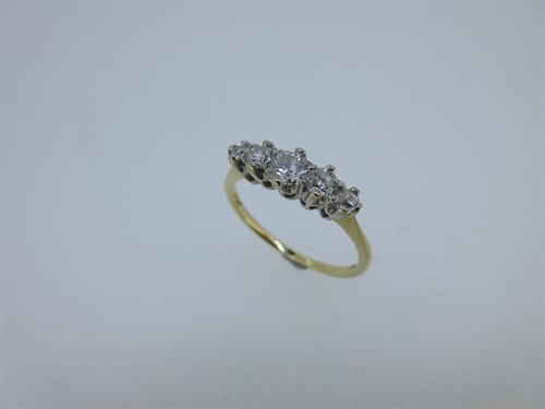 Lot 56 - A five stone diamond ring