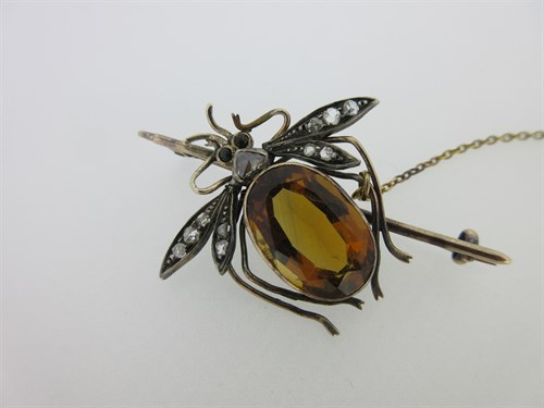Lot 84 - A Victorian diamond and citrine insect pin