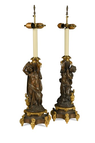 Lot 302 - A pair of 19th century French bronze and ormolu lamps