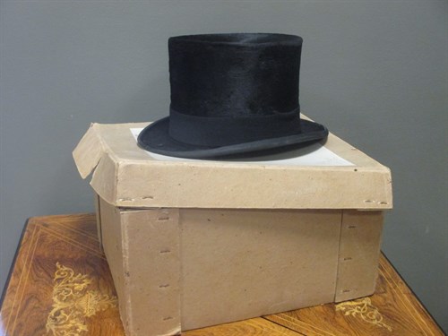Lot 237 - A leather cased top hat and one other hat (2)