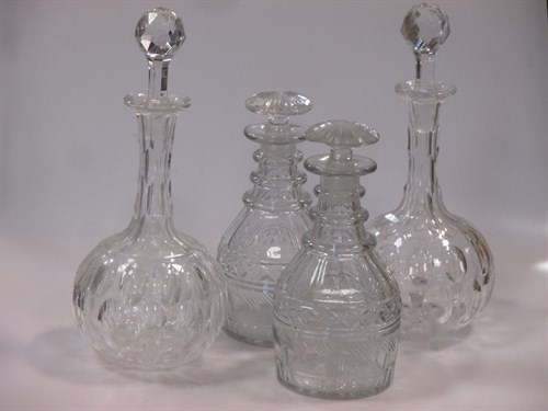 Lot 212 - Two pairs of cut glass decanters (chipped) (4)