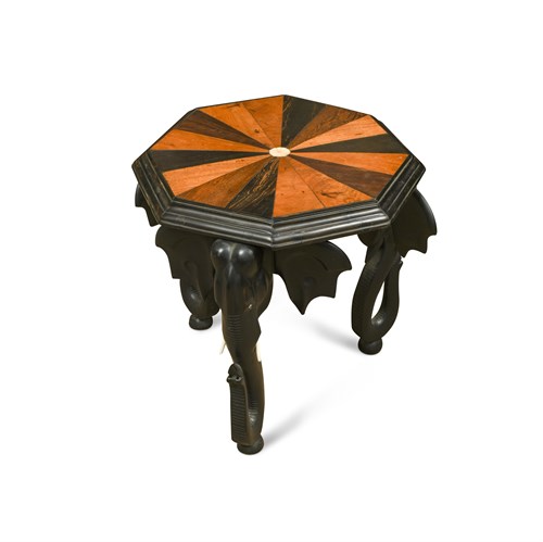Lot 344 - A 19th century Ceylonese ebony and specimen wood miniature table