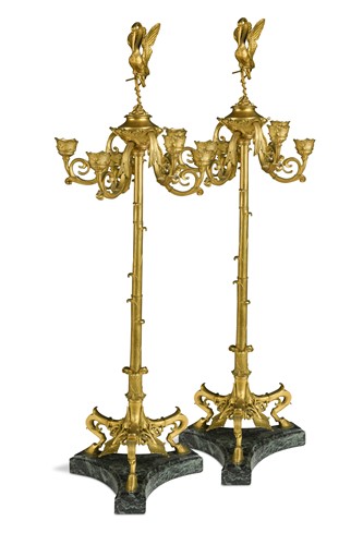 Lot 316 - A pair of French Empire six light candelabra