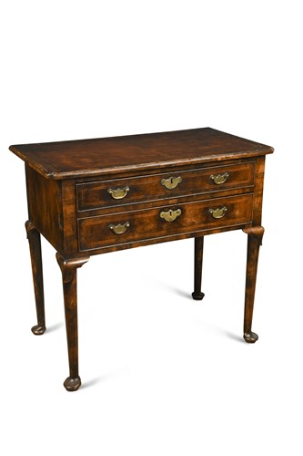 Lot 404 - An 18th century walnut lowboy