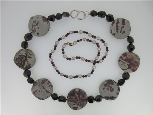 Lot 98 - A garnet and cultured pearl necklace together with another garnet and stone necklace
