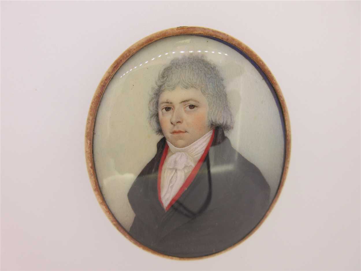 Lot 125 - A portrait miniature attributed to Adam Buck with hairwork and enamel back
